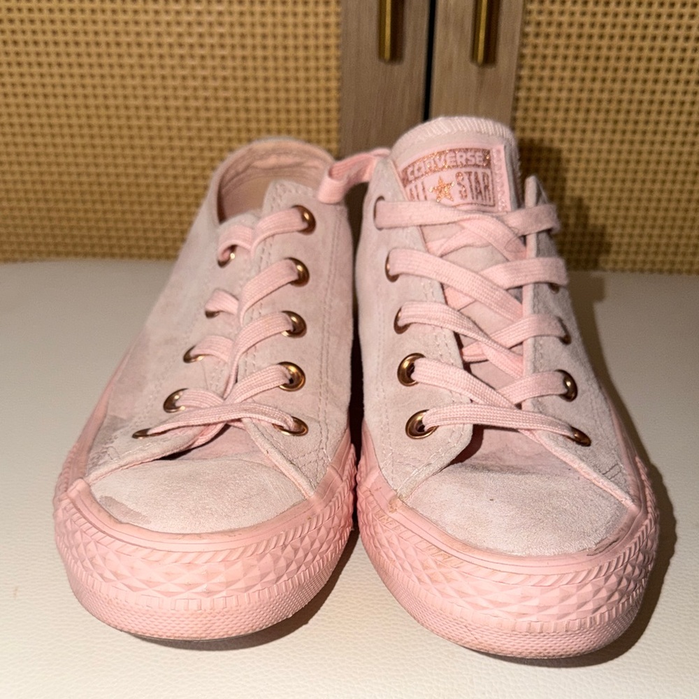 Converse Low Top Sneakers in Light Pink with Gold Eyelets